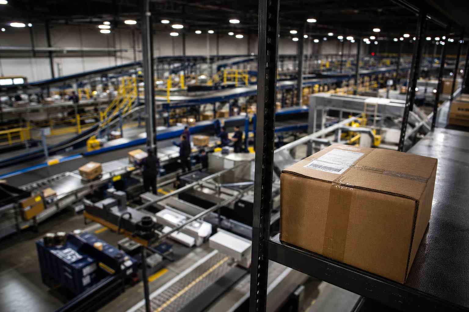 Package sitting on a shelf inside a regional shipping sorting facility
